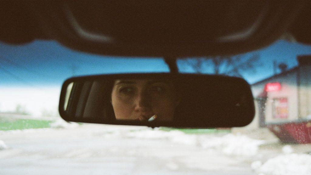 Lily Gladstone stars as Tana, a grieving young woman on an unexpected cross-country road trip through the American Midwest. | Credit: Morrisa Maltz (c)2022 Morrisa Maltz, LLC