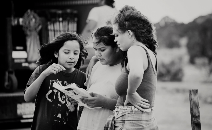 Actors Keir Tallman (Benny), Charley Hogan (Dawn), and Kahara Hodges (Aunt Lucy) go over their script on the set of 'Frybread Face and Me' (Photo by Cybelle Codish)